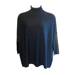 OVERSIZED GROMMET TURTLENECK SWEATER